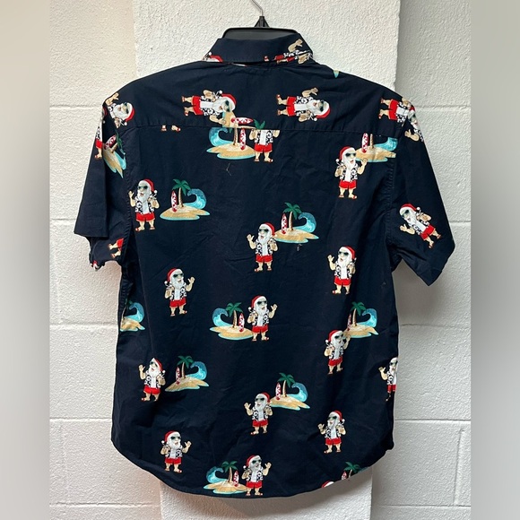 Denim & Flower Ricky Singh
Christmas Santa Claus on Beach, Drinking - Picture 4 of 4